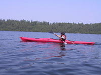 Gerald in the canoe showing off his stroke